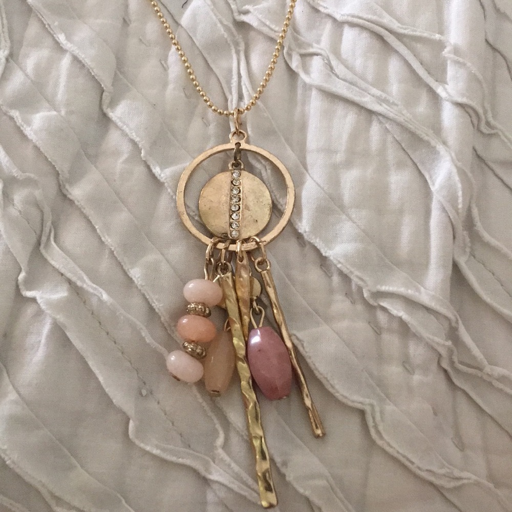 Long gold necklace